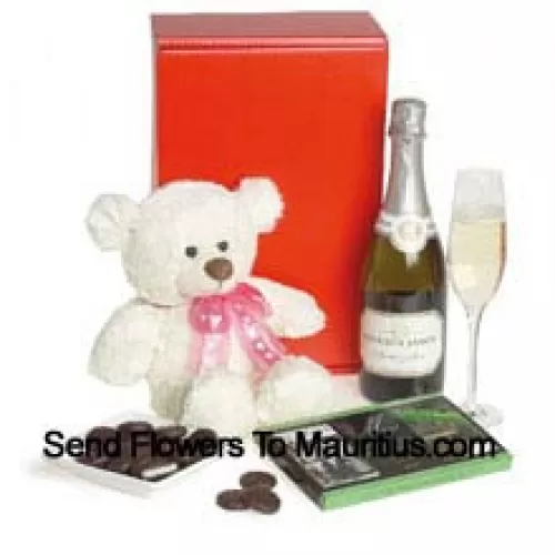 This exclusive wine hamper comes with Pierre Legendre Brut Sparkling (France) accompanied with an 8 Inches Cute White Teddy Bear And An Imported Box Of Chocolate. (Contents of basket including wine may vary by season and delivery location. In case of unavailability of a certain product we will substitute the same with a product of equal or higher value)